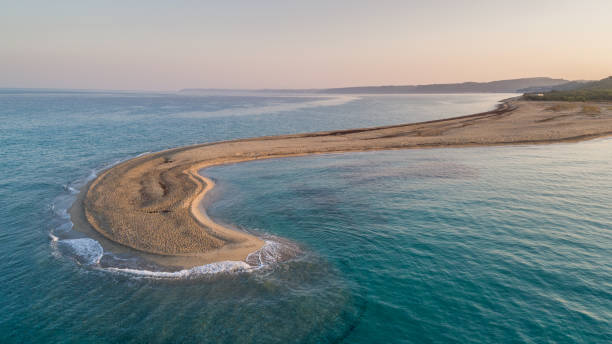 istock sunrise in Possidi Cape beach 1206663308
