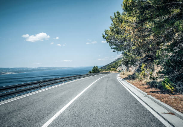 istock Country highway on a summer day. 1206663786
