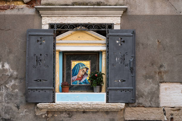 Small altar on a house in Venice (Italy)