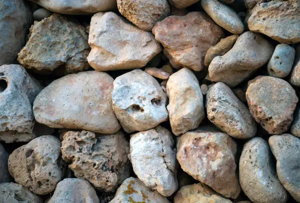 ancient Hisotric limstone building wall background in the Mediterranean.