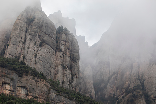 fog in Montserrat mountain, rock needles on fog, Talaies and Cap del camell dels Ecos.
