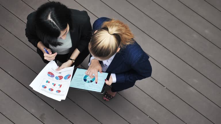 Two business person talking