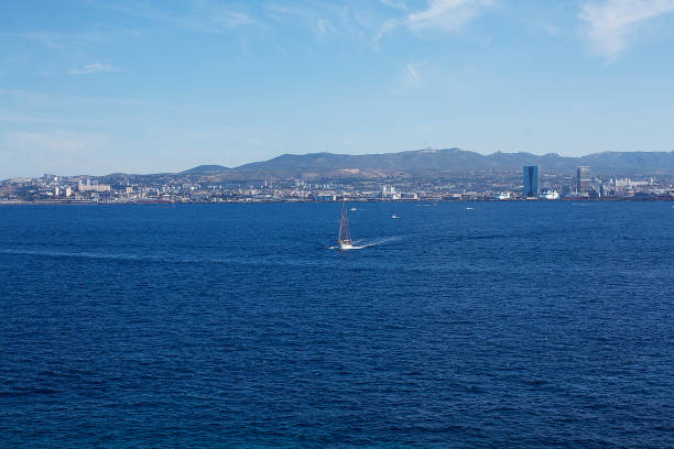 View of boats and Marseilles from the sea