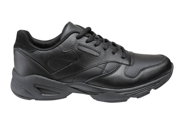 istock one black sports shoe with a thick sole, on a white background 1206675273