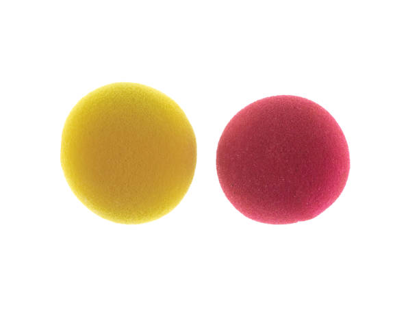istock red and yellow sponge ball, Red Nose Day isolated on white background 1206677430