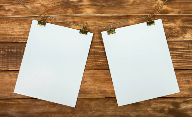 istock Sheets of white paper hanging on a rope 1206678144