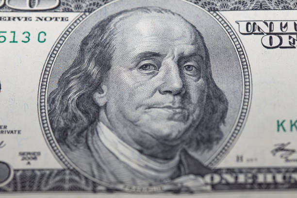 istock fragment of 100 dollar bill 1206678646