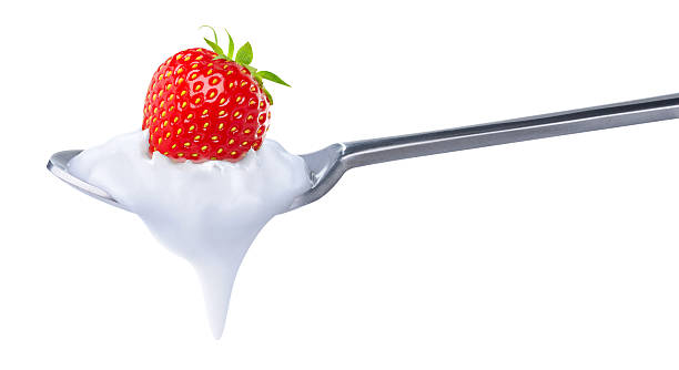 istock Strawberry on a spoon with yogurt 120668203