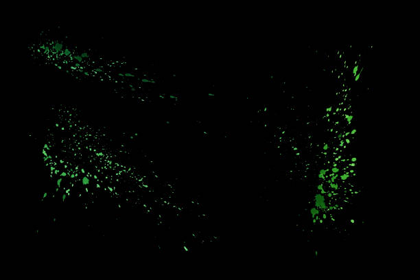 istock Green watercolor splashes isolated on black background. Color paint splatter 1206682943