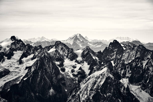 black and white mountain landscape in the alps, france. - natural landmark winter season mountain peak imagens e fotografias de stock