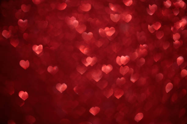 istock Red hearts bokeh as background. Love, wedding or Valentine's day background 1206683004