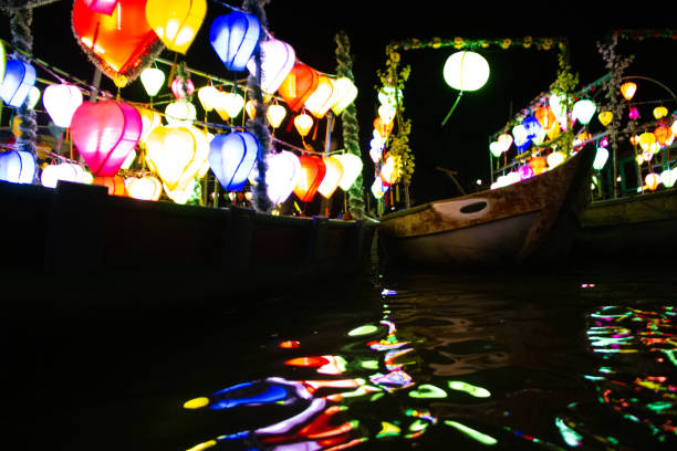 istock Chinese Lanterns on a boat reflecting in water 1206683689