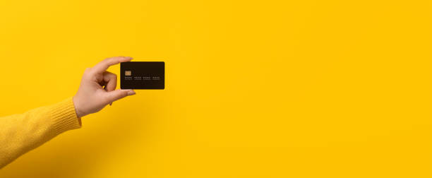 istock bank card in hand 1206685296