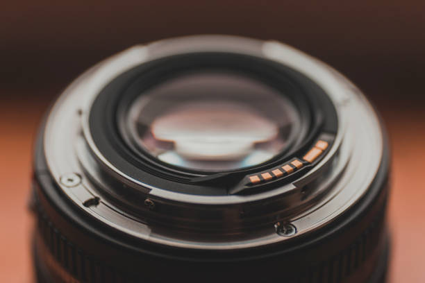istock close-up on lens mount on wooden background 1206686496