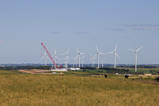 Crane sitting ready to start building a new wind turbine.