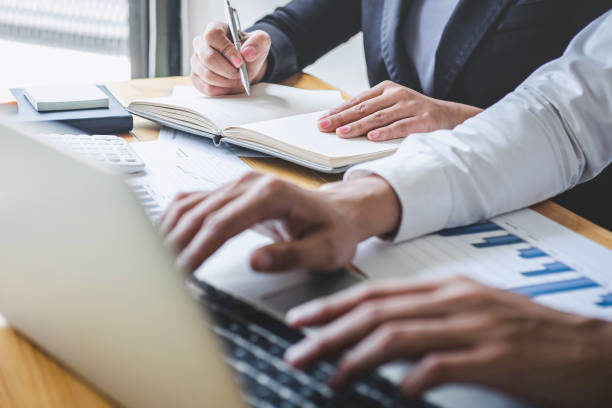 istock Professional Business partner discussing ideas planning and presentation project at meeting working and analysis at workspace, financial and investment concept, collaborative teamwork analyze data 1206687966