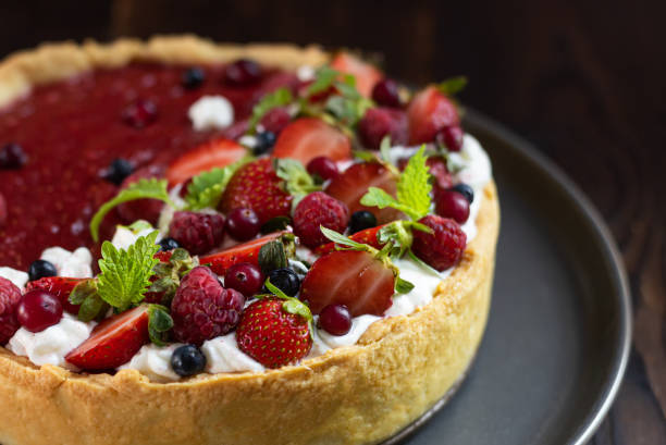 istock Food styling with fresh fruit tart berries. 1206690808