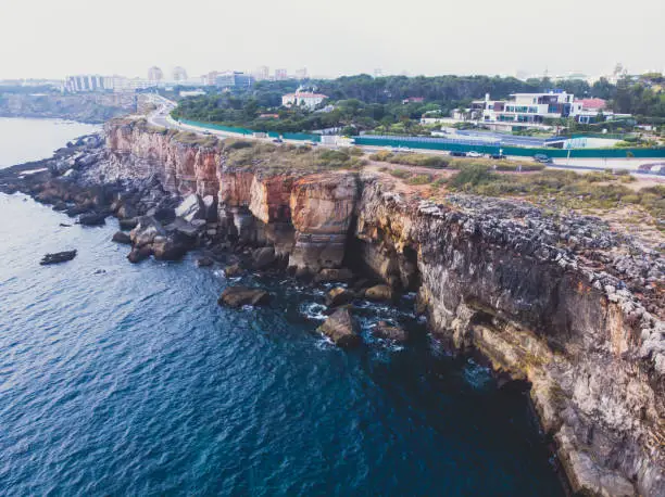 Beautiful aerial vibrant view of Boca Do Inferno (Hell's Mouth), Cascais, District of Lisbon, Portugal, shot from drone"n