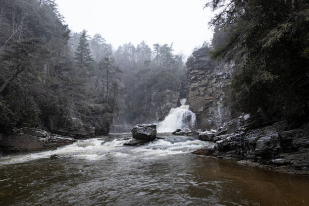 Hiking on a snowy winter day at Linville Falls, North Carolina.