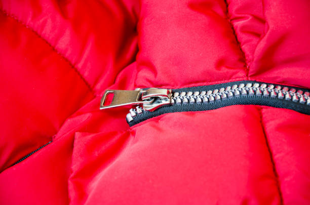 istock Metallic zipper on a red women's jacket 1206695698