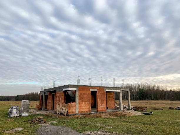 istock Family brick house under construction 1206697856