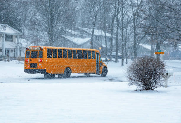 istock Suburban Winter Blizzard School Bus 1206699255