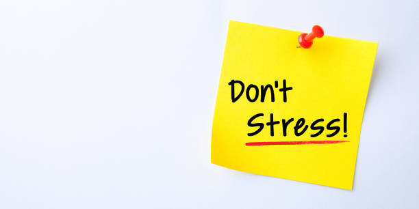 istock Yellow Sticky Note With Don't Stress And Red Push Pin On White Background 1206700691