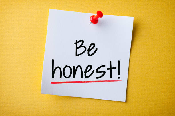 istock White Sticky Note With Be Honest And Red Push Pin On Yellow Background 1206700745