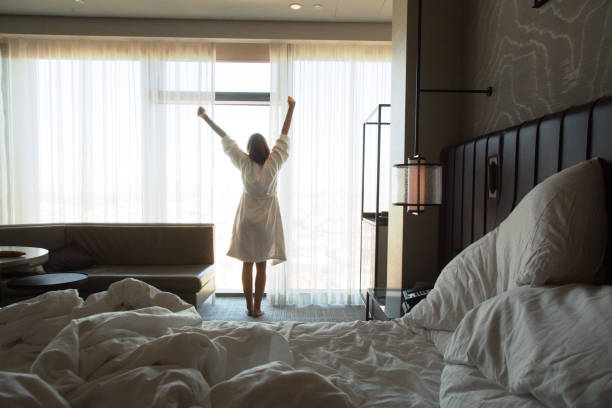 istock Upper body mobility, Beautiful young woman stretching after waking up 1206709247