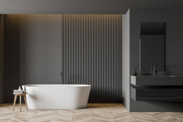 istock Gray bathroom interior with tub and sink 1206709898