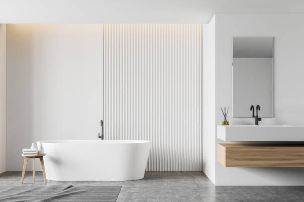 istock White bathroom interior with tub and sink 1206711094