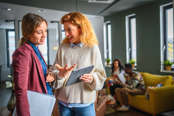 istock Caucasian Business Women Exchanging ideas 1206712395