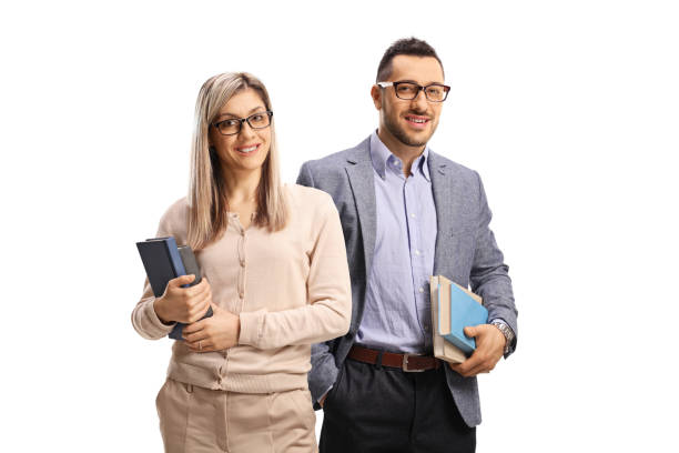 istock Young man and woman holding books 1206713885