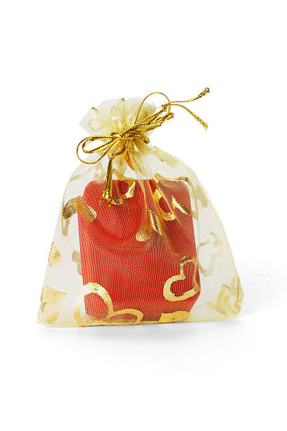 istock Red jewellery box in gold sachet 120671635