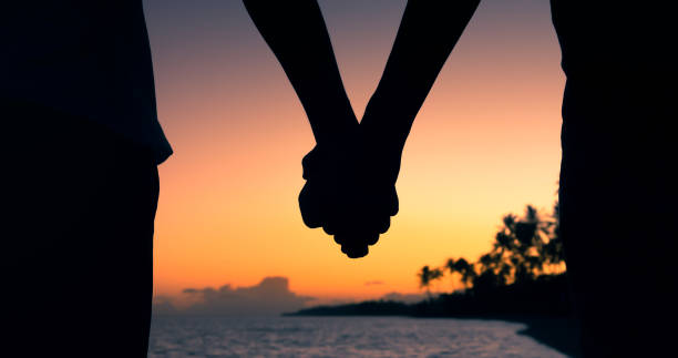 istock Couple at the beach 1206716543