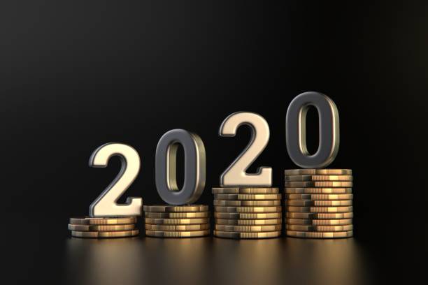 istock Stacked Coins and 2020 on Black background stock photo 1206717455