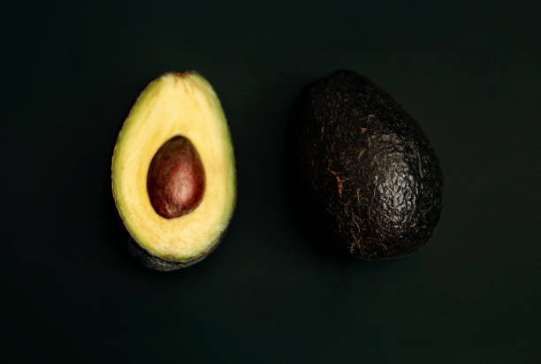 Avocado on dark background stock photo