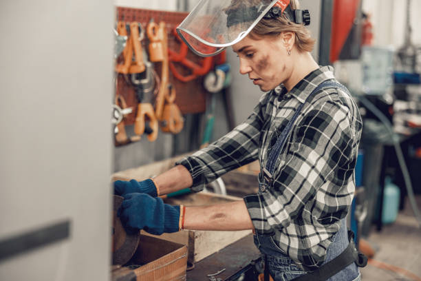 istock Focused woman working at a service station 1206720393