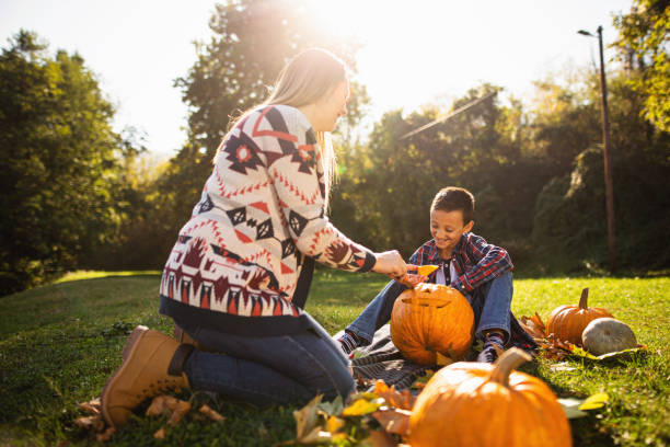 istock Mother and son following Halloween tradition 1206721014