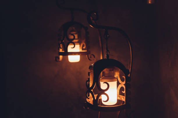 istock Vintage art deco ceiling lamp fixture in dark hallway. 1206721721