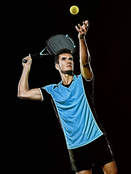 istock caucasian young tennis player man isolated black background 1206727893