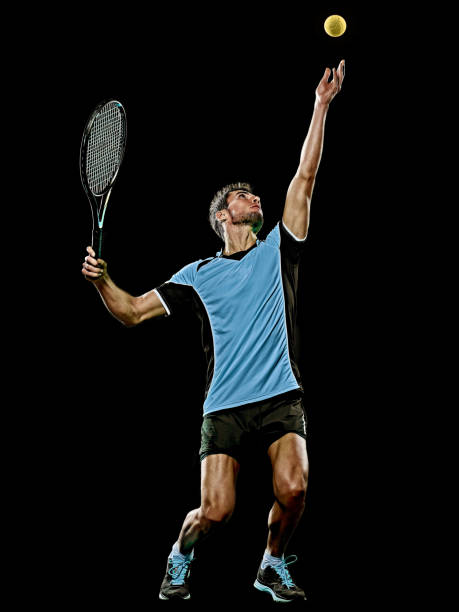 istock caucasian young tennis player man isolated black background 1206727922