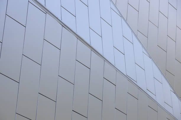 istock Relief white tiled wall of modern minimalistic geometrically designed building 1206730781