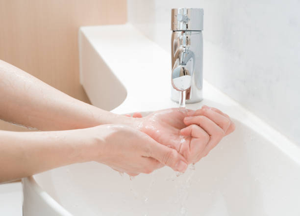 istock Asian woman hands being dried with tissue paper 1206731392