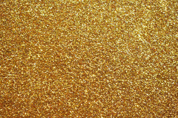 istock Abstract gold glitter sparkle background 1206731540