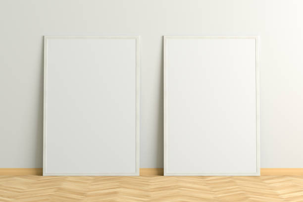 istock Blank poster frame mock up standing on the floor next to wall 1206736295