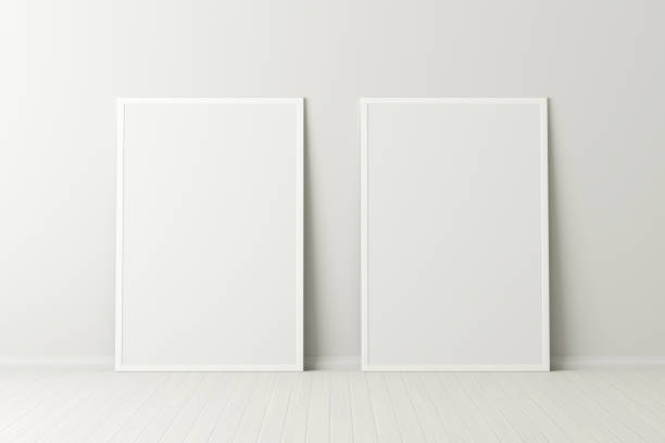 istock Blank poster frame mock up standing on the floor next to wall 1206736318
