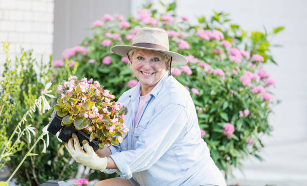 istock Senior woman gardening 1206737108