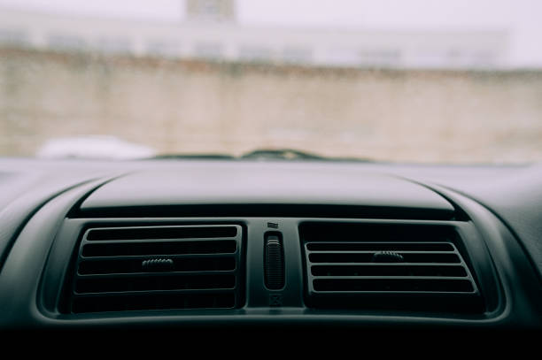 istock Dashboard plastic black panel in the car. The system of car heating. Warming up the car in bad weather in winter. 1206741724