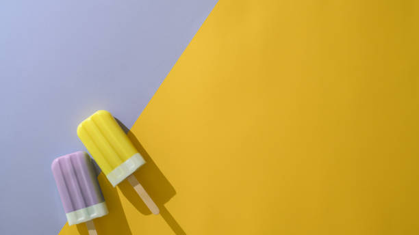 istock Top view of two colourful popsicles , creative minimal summer concept 1206748703